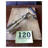 Vintage cutting board and hand mixer