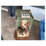 Old baby doll trunk decorated for the holidays