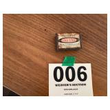 Early advertising match holder for Buckwater