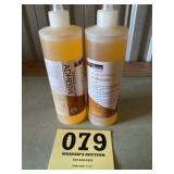 Two bottles tongue, and groove floor adhesive