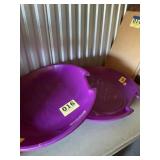 Two plastic saucer, sleds