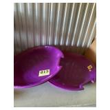 Two plastic saucer, sleds