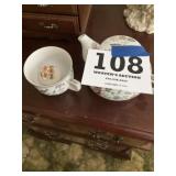 Teapot and cup