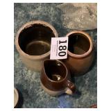 Vintage crocs and pitcher some damage