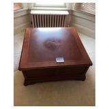 Large square living room, coffee table with