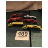 Plastic NASCAR haulers some with cars