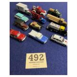 Diecast and plastic vehicle lot for train