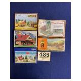 Train accessories houses in church lot