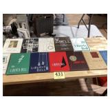 15 different years of high school yearbooks from