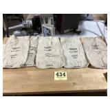Lots of old money bags and a rabbit feed bag and
