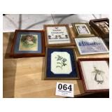 Lots of old picture frames and decorative items