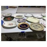 Table lot of decorated plates and collectibles