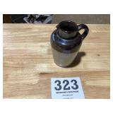 Old brown and tan stoneware pitcher