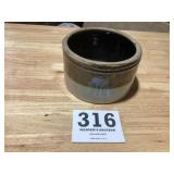 Small brown and tan stoneware crock