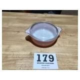 Vintage pink Pyrex baking dish with glass lid