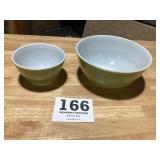 Two pieces of vintage, green Pyrex, mixing bowls