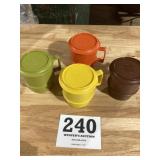4 Tupperware Mugs with lids like new