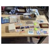 Miscellaneous lot of trading cards, pins, and