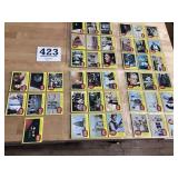 Five sleeves of Star Wars trading cards from the