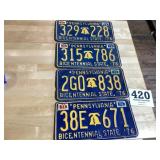 Four Pennsylvania bicentennial license plates