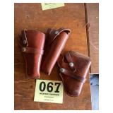 Three holsters