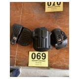Three holsters