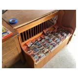 Wooden hallway, storage bench. Cars not included.