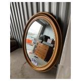 Framed oval mirror