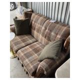 Upholstered loveseat, and two pillows