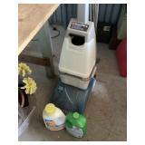 Hoover steam back with cleaning supplies