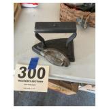 Two sad irons one made in Mexico