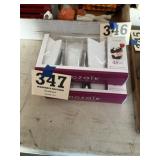 Two boxes tasting cups