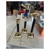 Three brass candlesticks