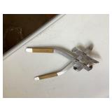 Stainless steel top opener.