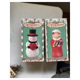 Carved snowman and Mrs Santa