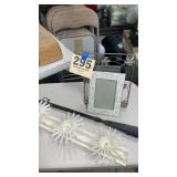 Metal picture, frame, shoehorn, and tie rack