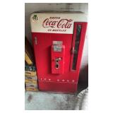 Vintage Coca-Cola $.10 soda machine with key