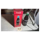 Vintage Coca-Cola bottle, contour rotating lamp