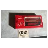 Coca-Cola advertising double-decker toy bus still