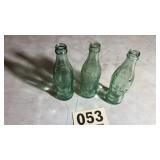 Lot of three vintage Coca-Cola 7 ounce bottles