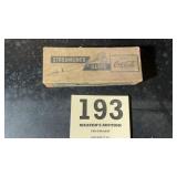 Old box of stream line darts with Coca-Cola