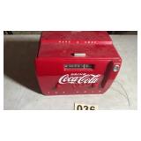 Tabletop a.m. and FM radio with advertising for