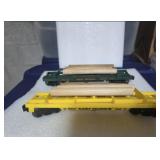 2 working Lionel Log Cars