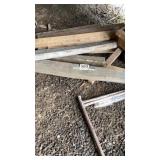 Lumber pile and brackets with screws