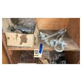 Large eyebolts and box of nuts and bolts shelf