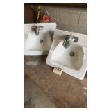 Two sinks with faucet