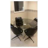 Glass top table and four chairs
