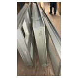 Three metal window frames