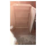 Three shelf closed cabinet