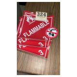 Three flammable signs and one Pennsylvania one